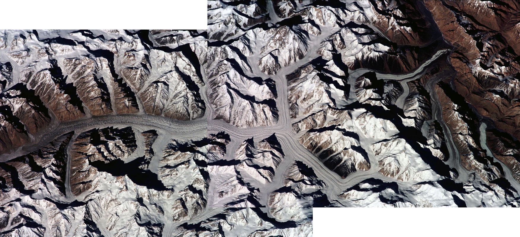 Nasa Baltoro Glacier K2 Broad Peak Gasherbrum I, II and IV Masherbrum ISS001-343-26 and 27 Baltoro Glacier from Paiju to Concordia with K2, Broad Peak, Gasherbrum I, Gasherbrum II and Gasherbrum IV, Masherbrum  - Nasa Image ISS001-343-26 and 343-27.